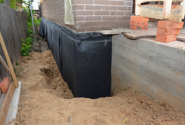 Happy homeowners after waterproofing job in Findlay